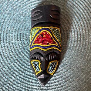 Beaded small wooden mask from Ghana
